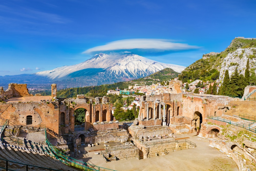 Greek theatre in Taormina, with Etna in background