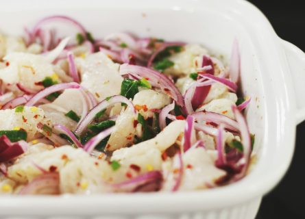 Ceviche: a dish made from fish or shellfish marinated in citrus and seasonings.