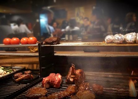 Lanzas y Fuego: A barbecue restaurant celebrated for its authentic Chilean flavors and grilled specialties in a warm, rustic setting