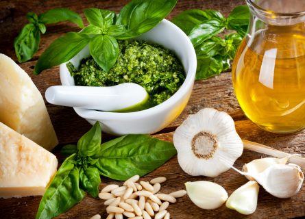 Pesto alla Genovese: a delicious blend of garlic, olive oil, pine nuts, basil leaves, and grated hard cheese